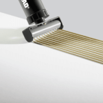 multiiiibead gun dispensing cladstikk 12 ms polymer surface bonding adhesive on hygienic wall cladding