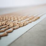 multiiiibead gun dispensed turfstikk ms210 ms polymer synthetic grass adhesive on henko seam tape