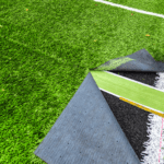 a close up of a green field